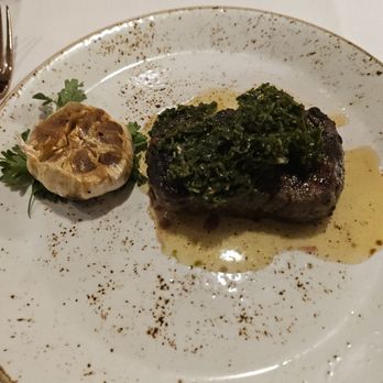 Oak & Ember Steakhouse - Steak with chimichurri and roasted garlic - Steakhouses Near Me - Stuart, Florida Oak & Ember Steakhouse - Steak with chimichurri and roasted garlic - Steakhouses Near Me - Stuart, Florida