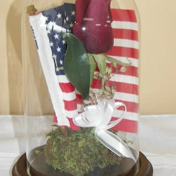 Floral Preservation and More - 4.5" x 8" Glass Dome with the American Flag and funeral flowers. - Florists Near Me - High Ridge, Missouri Floral Preservation and More - 4.5" x 8" Glass Dome with the American Flag and funeral flowers. - Florists Near Me - High Ridge, Missouri