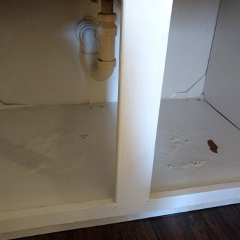 Tramor at Creek Village - water damage under sink - Apartments Near Me - Austin, Texas Tramor at Creek Village - water damage under sink - Apartments Near Me - Austin, Texas