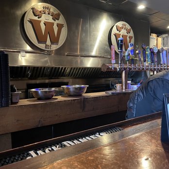 The Whiskey - Bar view of kitchen area - American Near Me - Orlando, Florida
