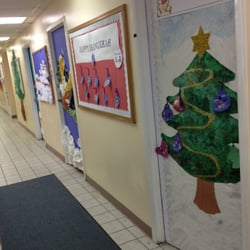 Positive Beginnings Preschool - Classroom door and halls are always decorated by the children's artwork.