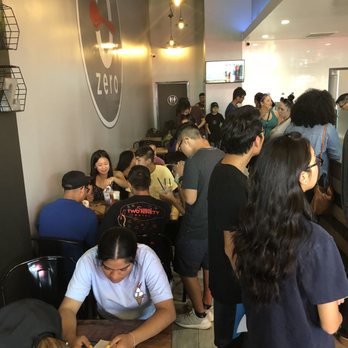 Zero Degrees - High tables in the front, low down the sides, and bathrooms in the back. - Bubble Tea Near Me - Arlington, Texas