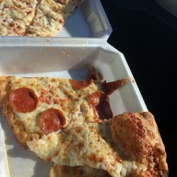 Best Little Pizza House In - Cheese and pepperoni pizza.
