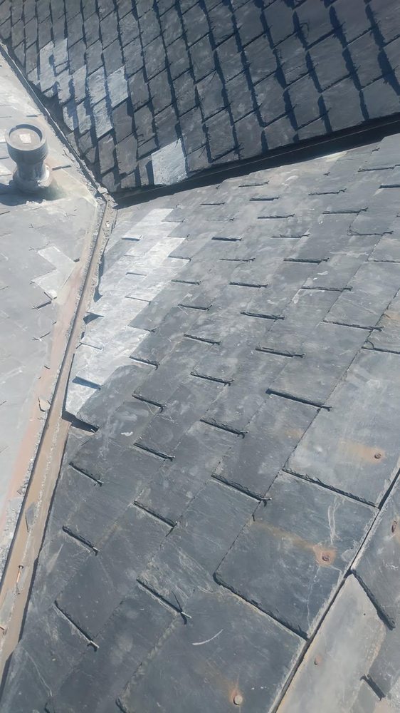 Slide of Ahn Top Roofing