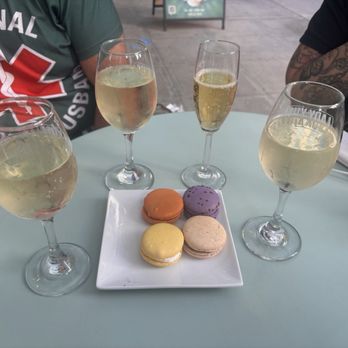 Lady Yum - Denny Triangle - 3 glasses of Prosecco, a glass of sparkling cider, and 4 macarons (peanut butter, blackberry, lemon, s'mores) - Macarons Near Me - Seattle, Washington Lady Yum - Denny Triangle - 3 glasses of Prosecco, a glass of sparkling cider, and 4 macarons (peanut butter, blackberry, lemon, s'mores) - Macarons Near Me - Seattle, Washington