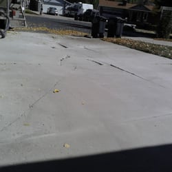 Crackerjack Mud Jacking - Destroyed drive way. Notice the sagging and heaving in areas.