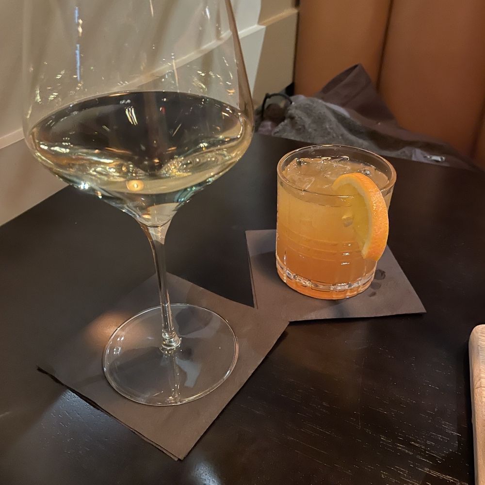 Beef + Bourbon Chophouse - a glass of wine and an orange slice - Steakhouses Near Me - Bettendorf, Iowa Beef + Bourbon Chophouse - a glass of wine and an orange slice - Steakhouses Near Me - Bettendorf, Iowa