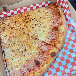 two slices of cheese pizza (missing the 7up) from their daily $7 special -  Cheese Pizza Slice
