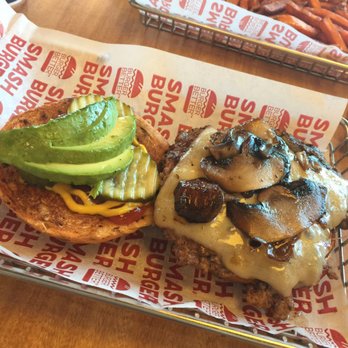 Smashburger - Regular burger with pepper jack cheese, pickles, mushrooms, avocado, ketchup and mustard on a spicy bun. - Burgers Near Me - Lehi, Utah Smashburger - Regular burger with pepper jack cheese, pickles, mushrooms, avocado, ketchup and mustard on a spicy bun. - Burgers Near Me - Lehi, Utah