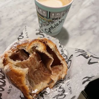 Goddess and the Baker, 44 E Grand - Inside of the Cinnamon roll cruffin, and apple butter latte - Bakeries Near Me - Chicago, Illinois Goddess and the Baker, 44 E Grand - Inside of the Cinnamon roll cruffin, and apple butter latte - Bakeries Near Me - Chicago, Illinois