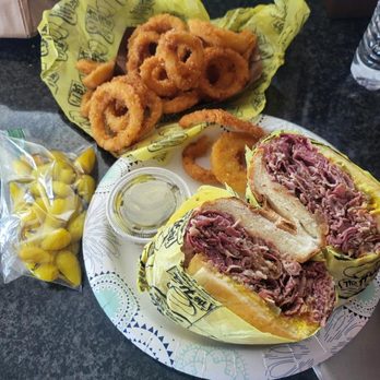 The Hat - Pastrami Dip with peppers & pickles, and a small onion ring. - Burgers Near Me - Las Vegas, Nevada The Hat - Pastrami Dip with peppers & pickles, and a small onion ring. - Burgers Near Me - Las Vegas, Nevada