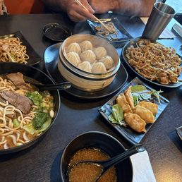 Spicy beef brisket noodle A1. Xiao Long Bao (Soup Dumplings) (8) potstickers, F4. Combination Chow Mein (Chicken & Beef & Shrimp) Spicy beef brisket noodle A1. Xiao Long Bao (Soup Dumplings) (8) potstickers, F4. Combination Chow Mein (Chicken & Beef & Shrimp)