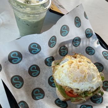 Sip Coffee & Beer - Avocado toast topped with an egg with a matcha - Coffee & Tea Near Me - Scottsdale, Arizona Sip Coffee & Beer - Avocado toast topped with an egg with a matcha - Coffee & Tea Near Me - Scottsdale, Arizona