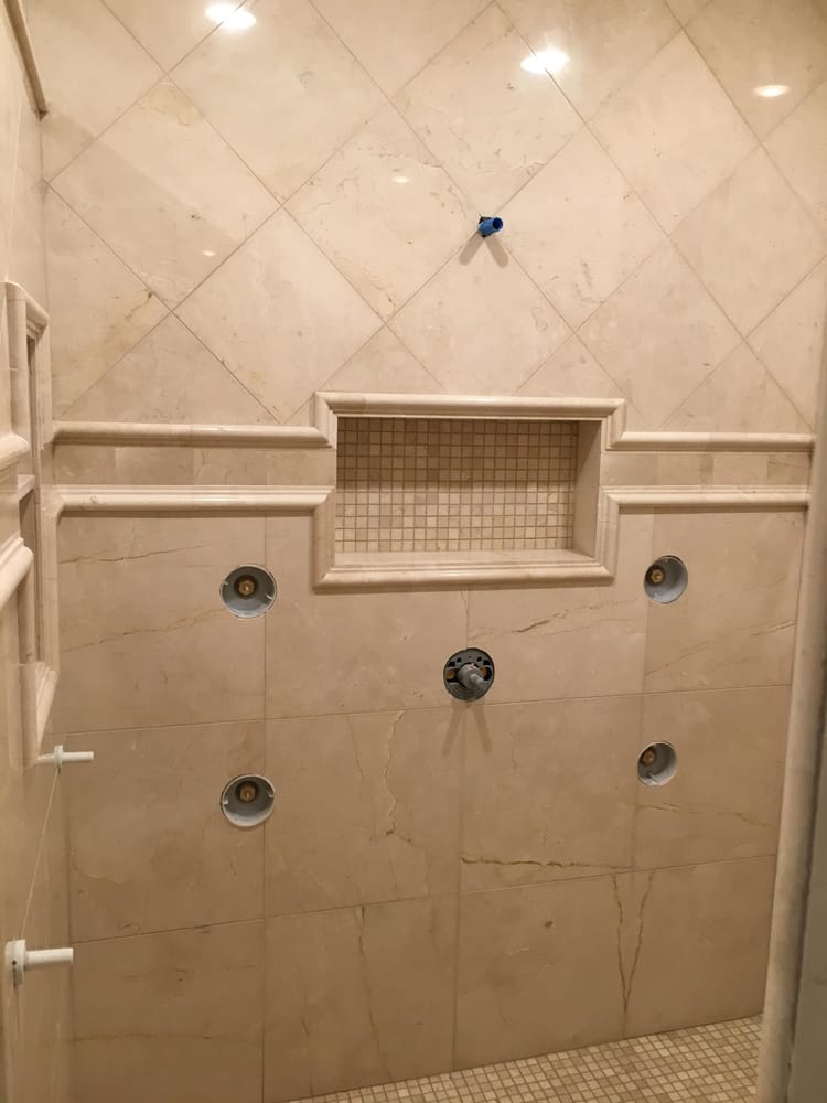 Slide of Evolution Tile & Marble, Inc.