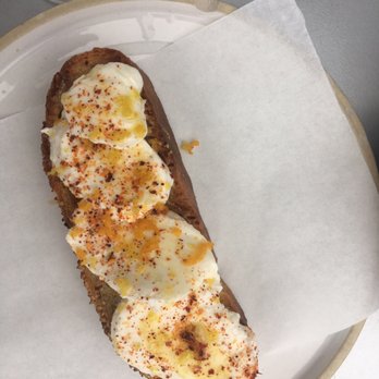 Lilia - Fresh Mozzarella w/heated lemon shavings and garlic toast - Italian Near Me - Brooklyn, New York Lilia - Fresh Mozzarella w/heated lemon shavings and garlic toast - Italian Near Me - Brooklyn, New York