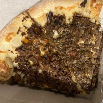 Cuts & Slices - Left - sweet chili oxtail  Right- brown stew oxtail - Pizza Near Me - St Albans, New York