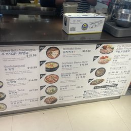 a menu on a counter in a restaurant