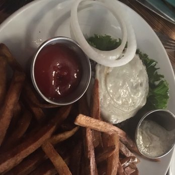Marble + Rye - Burger (no bun) with cheese on top.     And fries. - Cocktail Bars Near Me - Buffalo, New York
