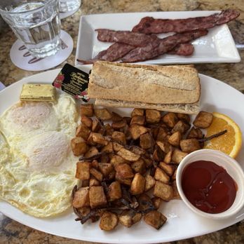 Greenstreet Cafe - Two eggs, potatoes, and turkey bacon - Breakfast & Brunch Near Me - Miami, Florida Greenstreet Cafe - Two eggs, potatoes, and turkey bacon - Breakfast & Brunch Near Me - Miami, Florida