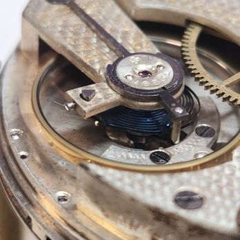 Heirloom Clocks - A Longines balance wheel, occilating happily! - Clock Repair Near Me - Scottsdale, Arizona Heirloom Clocks - A Longines balance wheel, occilating happily! - Clock Repair Near Me - Scottsdale, Arizona