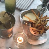 Foto de The Terrace and Outdoor Gardens - New York, NY, Estados Unidos. Side of fries with fondue  And cocktails