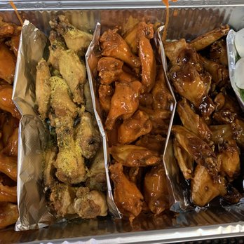 Macon Wings - a variety of wings in a foil container - Chicken Wings Near Me - Macon, Georgia
