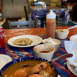Latin Patio Restaurant - Caldo de Mariscos (Seafood Soup) Pupusa Loroco and cheese