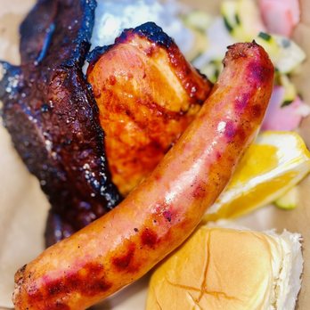 B’s Kitchen & Grill - Combo Beef Kalbi short rib with chicken and pineapple sausage - Caterers Near Me B’s Kitchen & Grill - Combo Beef Kalbi short rib with chicken and pineapple sausage - Caterers Near Me