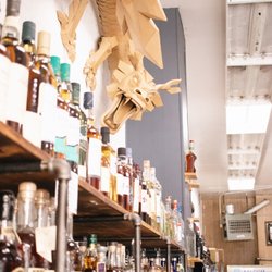 Nopa Corner Market - Dragon trying to have some of the liquor!
