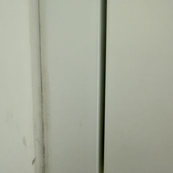Western Disaster Cleanup - wrong and poorly applied caulk on custom cabinets - Damage Restoration Near Me - Provo, Utah