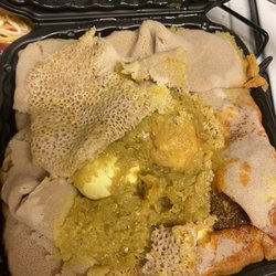 Glo Lalibela Restaurant - This is suppose to be a platter for FOUR people... yes 4. This is not $55 dollar's worth of food. This is a scam.