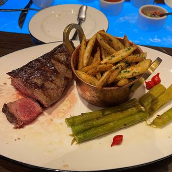 Libertango Steakhouse - Corazon de Cuadril with a side of papas fritas, and a side of espárragos - Steakhouses Near Me - Sandy, Utah Libertango Steakhouse - Corazon de Cuadril with a side of papas fritas, and a side of espárragos - Steakhouses Near Me - Sandy, Utah