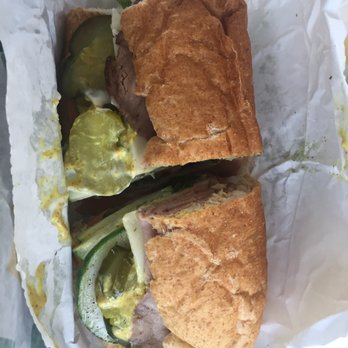 Subway - a half eaten sandwich with pickles and cucumbers - Sandwiches Near Me - Jacksonville, Florida Subway - a half eaten sandwich with pickles and cucumbers - Sandwiches Near Me - Jacksonville, Florida
