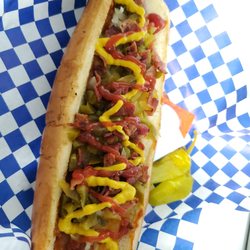 U Hanngry - Footlong with cheese sauce,chili beans,grilled onions Jalapeños and bacon.
