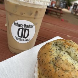 Vanilla cold brew with sweet cream and an almond lemon poppy seed gigantic muffin