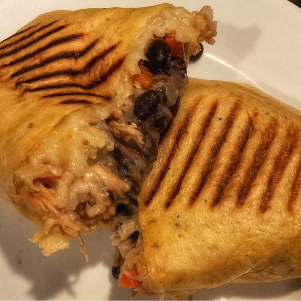 Green Room Cafe - "The Secret Spot" - $15.78  Filled with black beans, brown rice, carrots, cheese, and chicken. - Bars Near Me - Cocoa Beach, Florida