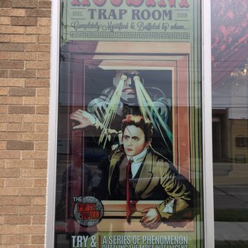 The Fifth Wall Escape Rooms - The Houdini Trap Room poster in the front window of the Fifth Wall, 1930 Hilton Rd #100, Ferndale, MI 48220. - Escape Games Near Me - Ferndale, Michigan The Fifth Wall Escape Rooms - The Houdini Trap Room poster in the front window of the Fifth Wall, 1930 Hilton Rd #100, Ferndale, MI 48220. - Escape Games Near Me - Ferndale, Michigan