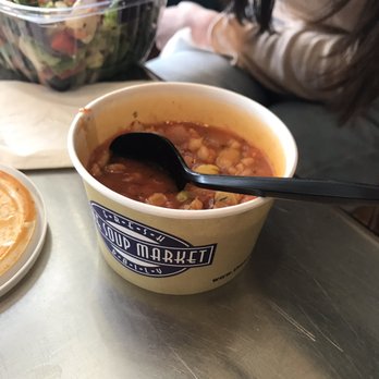 The Soup Market - a bowl of soup with a spoon in it - Soup Near Me - Milwaukee, Wisconsin The Soup Market - a bowl of soup with a spoon in it - Soup Near Me - Milwaukee, Wisconsin