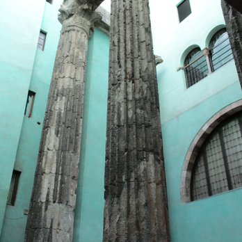 Temple d'August - Two of the Roman columns in the Temple T'August - Landmarks & Historical Buildings Near Me - Barcelona, B Temple d'August - Two of the Roman columns in the Temple T'August - Landmarks & Historical Buildings Near Me - Barcelona, B