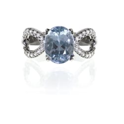Fairfield Center Jewelers - Aquamarine ring with brilliant cut diamonds set in 14kt gold.