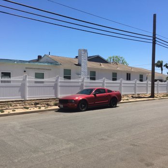 Andy Builders - Vinyl fence in front yard - General Contractors Near Me