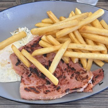 El Rinconcito Latino - Expertly cooked over medium eggs with homemade ham and crispy french fries. - Latin American Near Me - Miami, Florida El Rinconcito Latino - Expertly cooked over medium eggs with homemade ham and crispy french fries. - Latin American Near Me - Miami, Florida