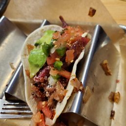 The Brisket Tacos were amazing! I don't usually eat brisket or barbecue, so this was a risky order for me. The 2 tacos were great!