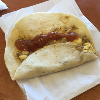 Campus Donuts - Breakfast taco. Egg and sausage with hot sauce - Donuts Near Me - Arlington, Texas Campus Donuts - Breakfast taco. Egg and sausage with hot sauce - Donuts Near Me - Arlington, Texas