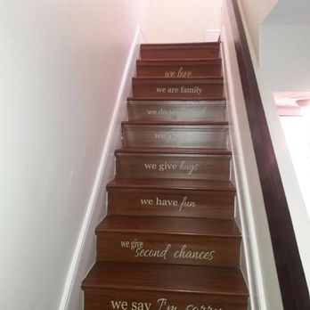 Tony Handyman - a set of stairs with the words we are family on them - Flooring Near Me Tony Handyman - a set of stairs with the words we are family on them - Flooring Near Me