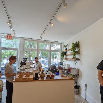 Persimmon Coffee - a group of people in a coffee shop - Coffee & Tea Near Me - Philadelphia, Pennsylvania