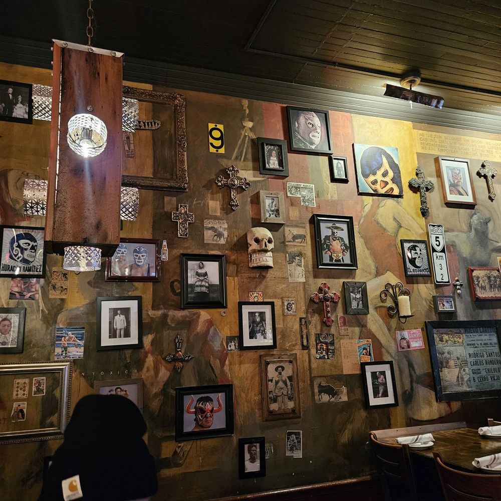 Momocho - Inside decor of luchadores and artwork - Mexican Near Me - Cleveland, Ohio Momocho - Inside decor of luchadores and artwork - Mexican Near Me - Cleveland, Ohio