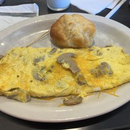 Softly cooked mushroom and cheese omelette. Softly cooked mushroom and cheese omelette.
