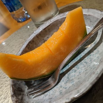 Photo of Restaurant Murata - Portland, OR, United States. A slice of melon for free