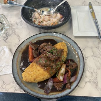 Mares Real Peruvian Cuisine - Tacu Tacu con Lomo Saltado Ceviche Ahmnado Fish - Peruvian Near Me - Orlando, Florida Mares Real Peruvian Cuisine - Tacu Tacu con Lomo Saltado Ceviche Ahmnado Fish - Peruvian Near Me - Orlando, Florida